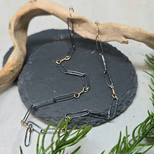 14K Gold Twisted Link Paperclip Chain in Hammered Sterling Silver | Collector Works