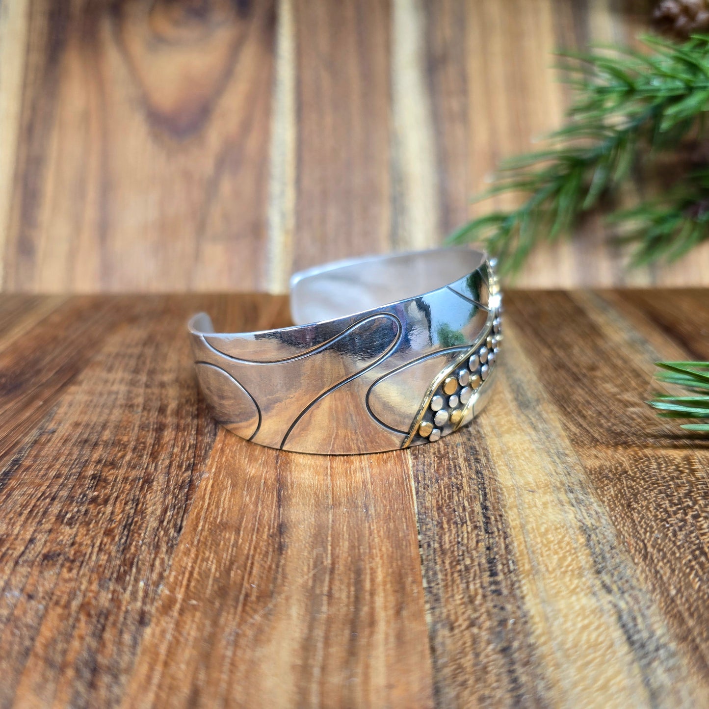 18k gold river rock detail on Argentium silver cuff