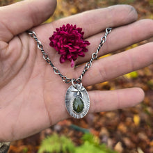 Load image into Gallery viewer, Hand-forged sterling silver dragonfly pendant with peridot gemstone, crafted in the Sterling Roots studio.