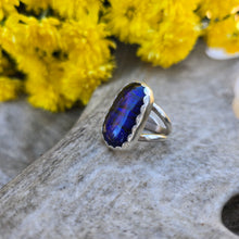 Load image into Gallery viewer, Handcrafted sterling silver ring featuring shimmering blue dichroic glass and double shank