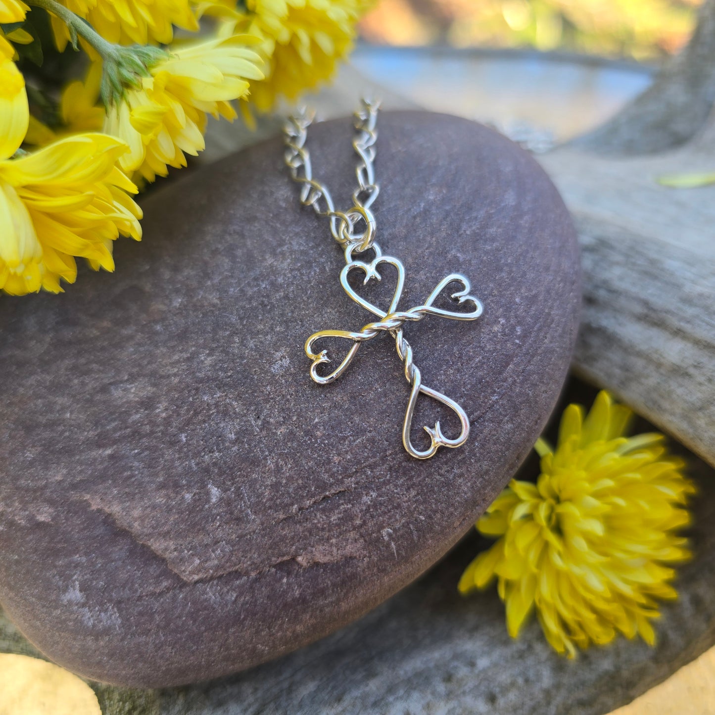 Handmade sterling silver cross and heart pendant by Sterling Roots