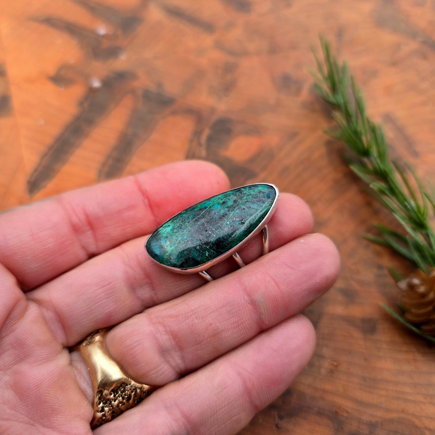 Triple shank sterling silver ring with azurite on hand
