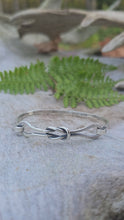 Load and play video in Gallery viewer, Elongated Knot Bangle Bracelet