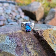 Load image into Gallery viewer, side profile of purple Mohave turquoise ring with textured sterling silver band
