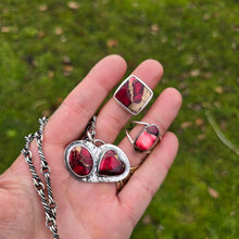 Load image into Gallery viewer, red dahlia mohave oval ring, square ring, double-stone pendant, and oxidized twisted link chain displayed on hand