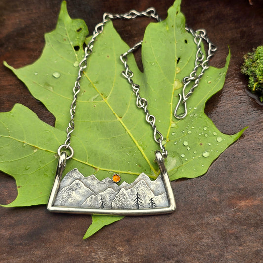 Three-Dimensional Mountain Scene Statement Necklace with Amber Sunrise