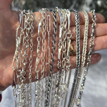 Load image into Gallery viewer, sterling silver shiny and oxidized chains shown on hand front view