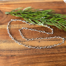 Load image into Gallery viewer, sterling silver dainty infinity link shiny chain displayed detailed view
