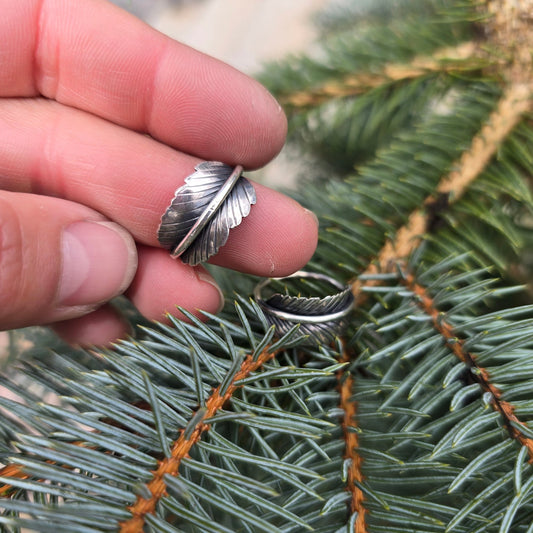 Detail of feather form on sterling silver ring