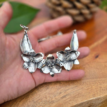 Load image into Gallery viewer, sterling silver necklace with three trillium flowers, leaf links, and heavy chain back displayed on hand