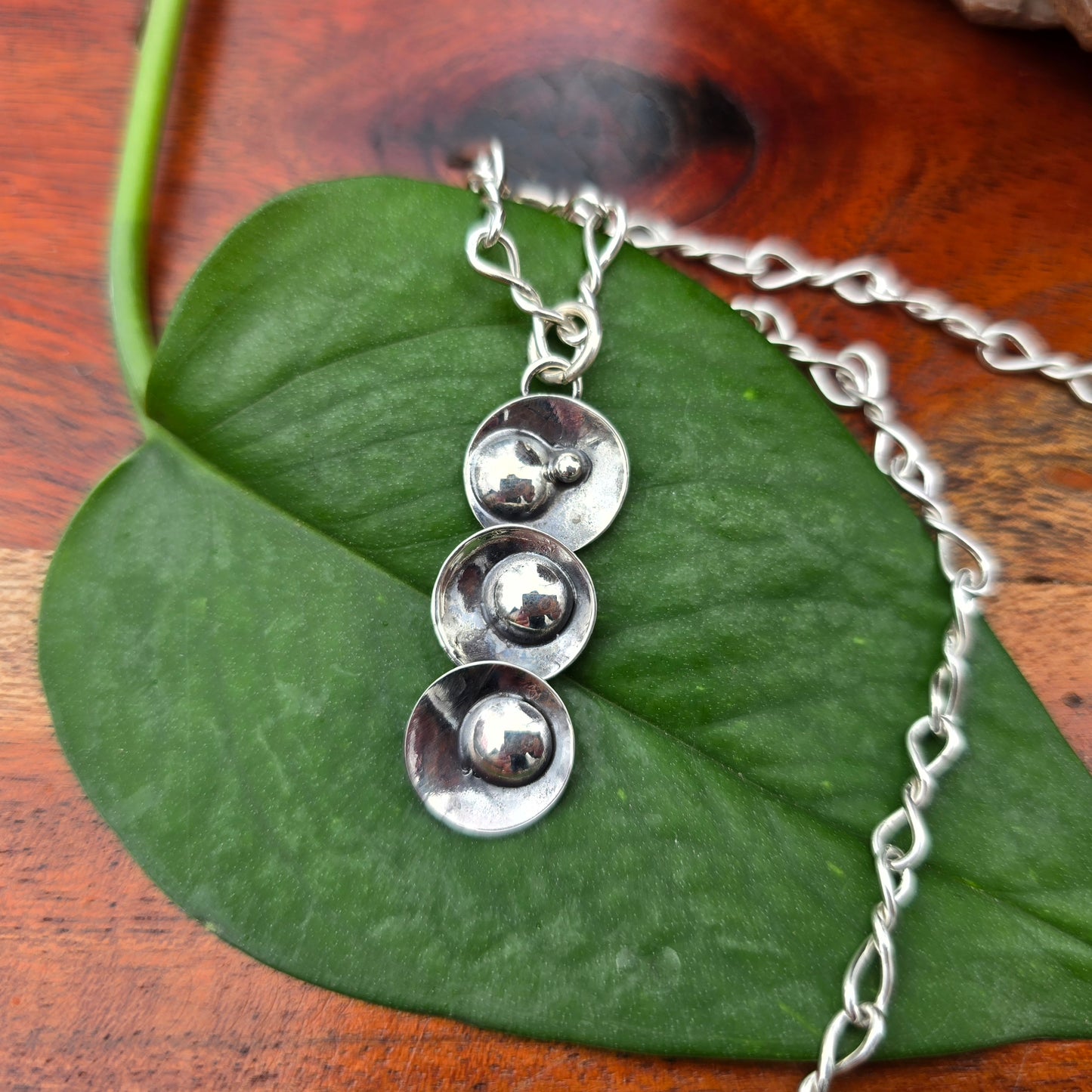 pendant featuring three sterling silver drops on oxidized chain