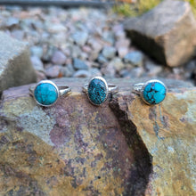 Load image into Gallery viewer, three turquoise rings with minimal bezels and simple silver bands displayed together