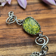 Load image into Gallery viewer, dichroic and sterling silver swirl bracelet detailed view