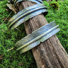 Load image into Gallery viewer, detailed top view of silver feather cuff bracelets