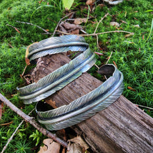 Load image into Gallery viewer, silver feather cuff bracelets angled view