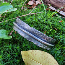 Load image into Gallery viewer, a single silver feather bracelet in moss
