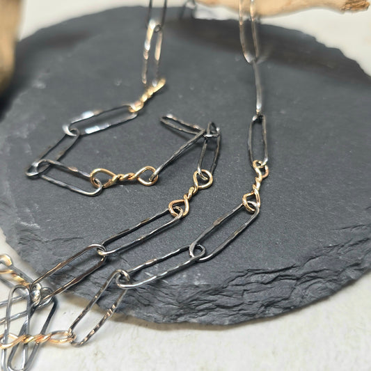 14K Gold Twisted Link Paperclip Chain in Hammered Sterling Silver | Collector Works