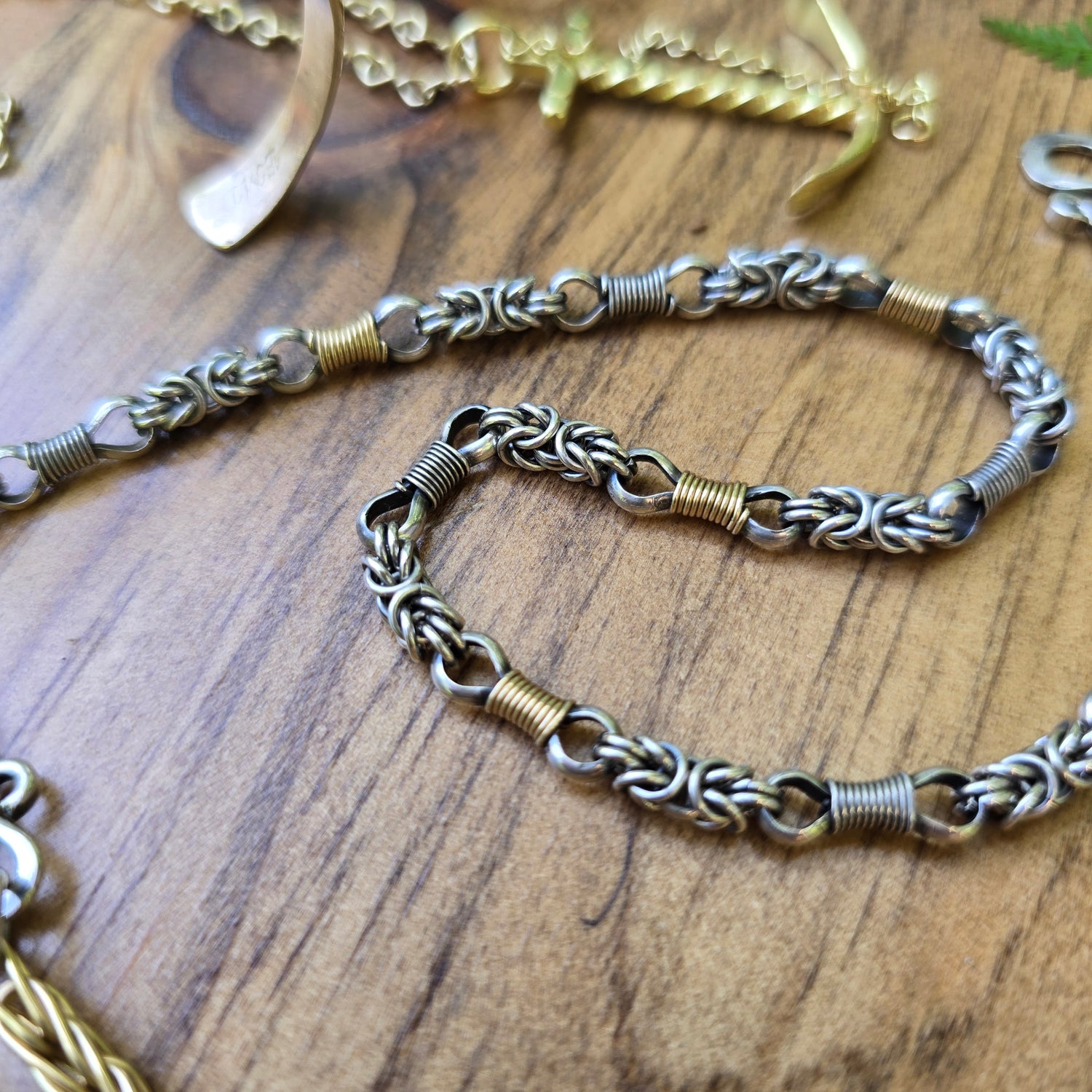 18k gold and sterling silver hand-forged chain detailed view.