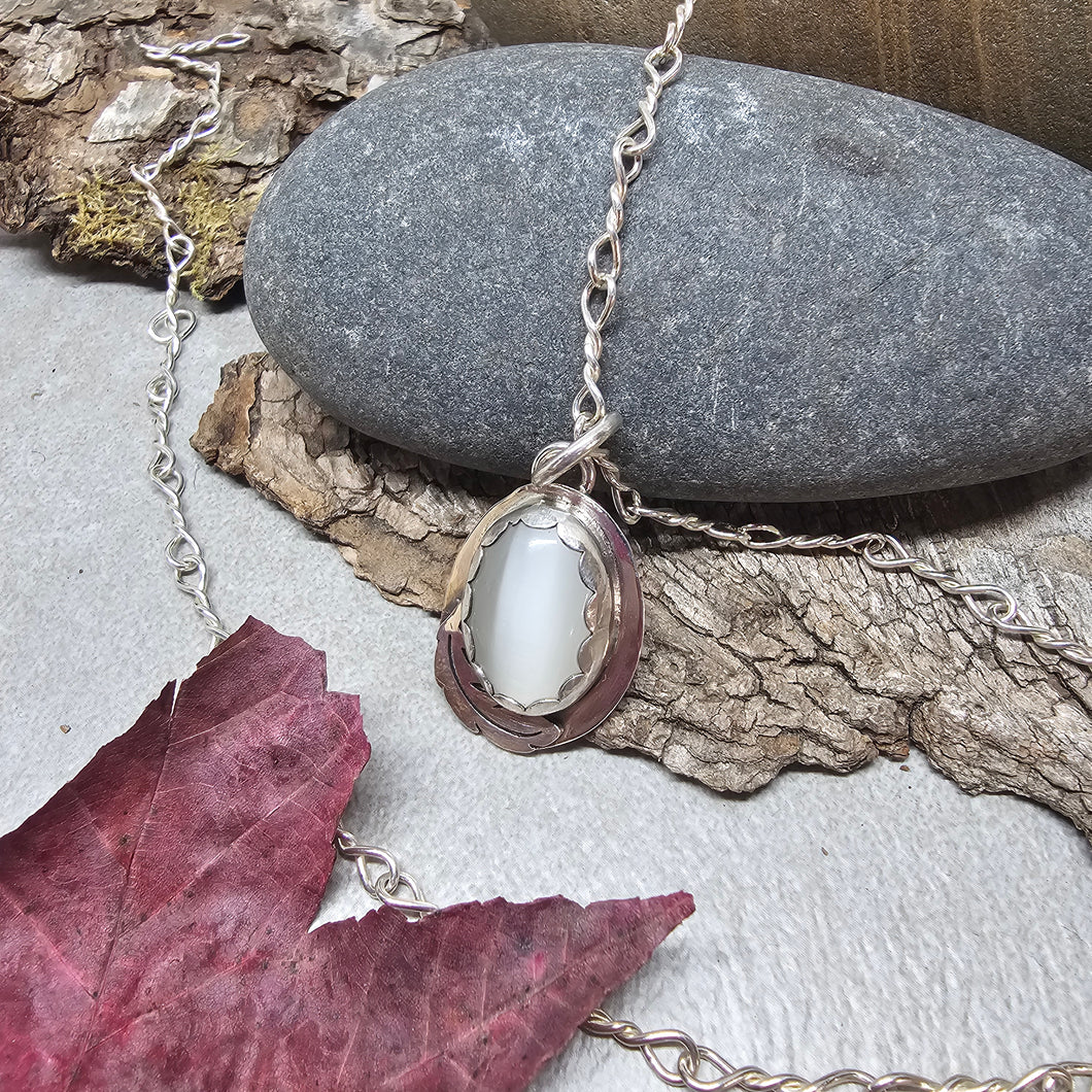 White Cats Eye and Feather Pendant
