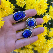 Load image into Gallery viewer, Sterling silver triple-band ring with deep blue dichroic glass, hand-forged in the Adirondacks by Sterling Roots
