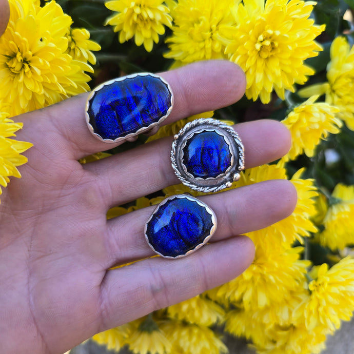 Sterling silver triple-band ring with deep blue dichroic glass, hand-forged in the Adirondacks by Sterling Roots