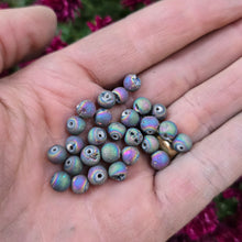 Load image into Gallery viewer, Close-up of rainbow druzy and sterling silver threader earrings forged by Emily Dicob at Sterling Roots.
