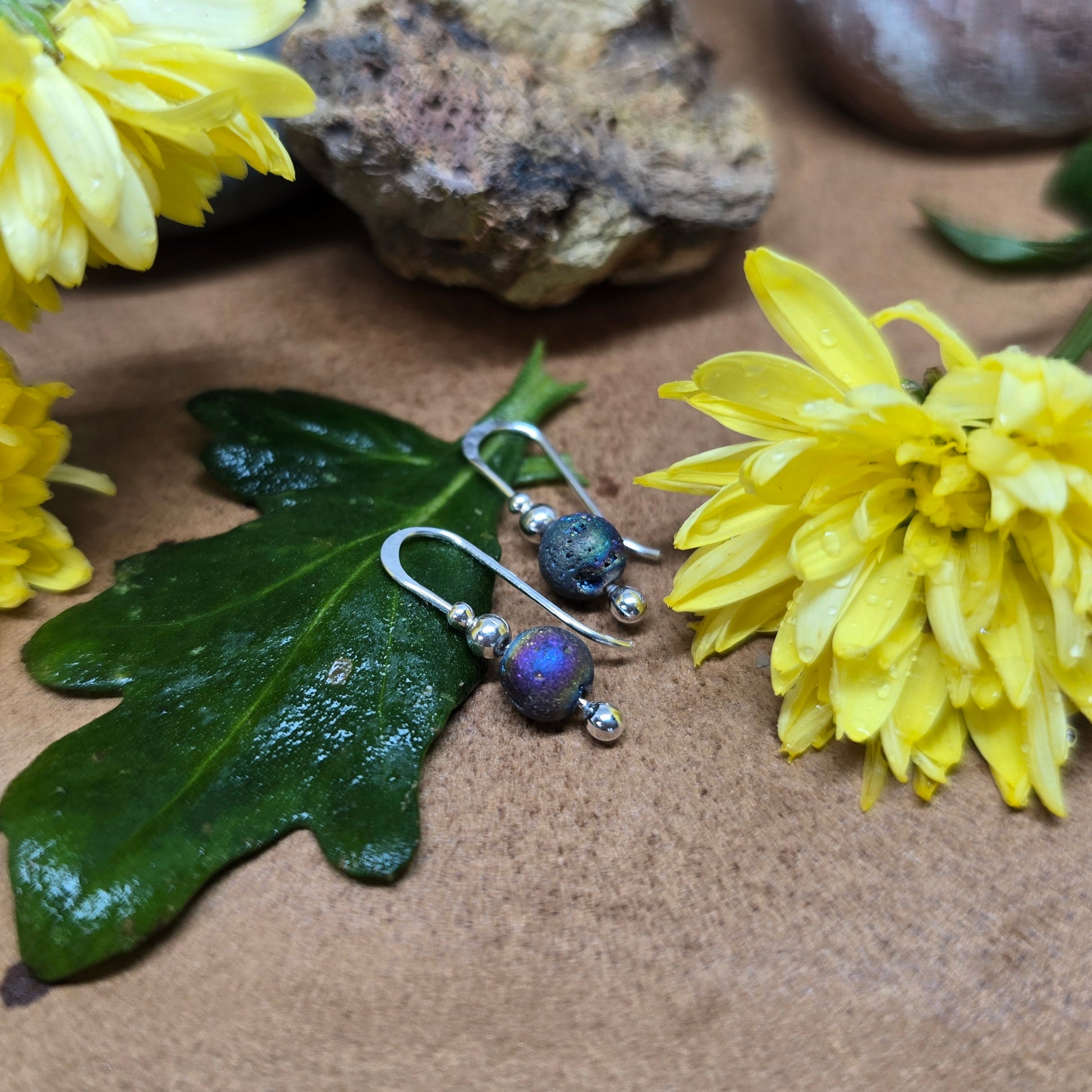 Hand-forged sterling silver threader earrings with rainbow druzy beads by Adirondack silversmith Emily Dicob.