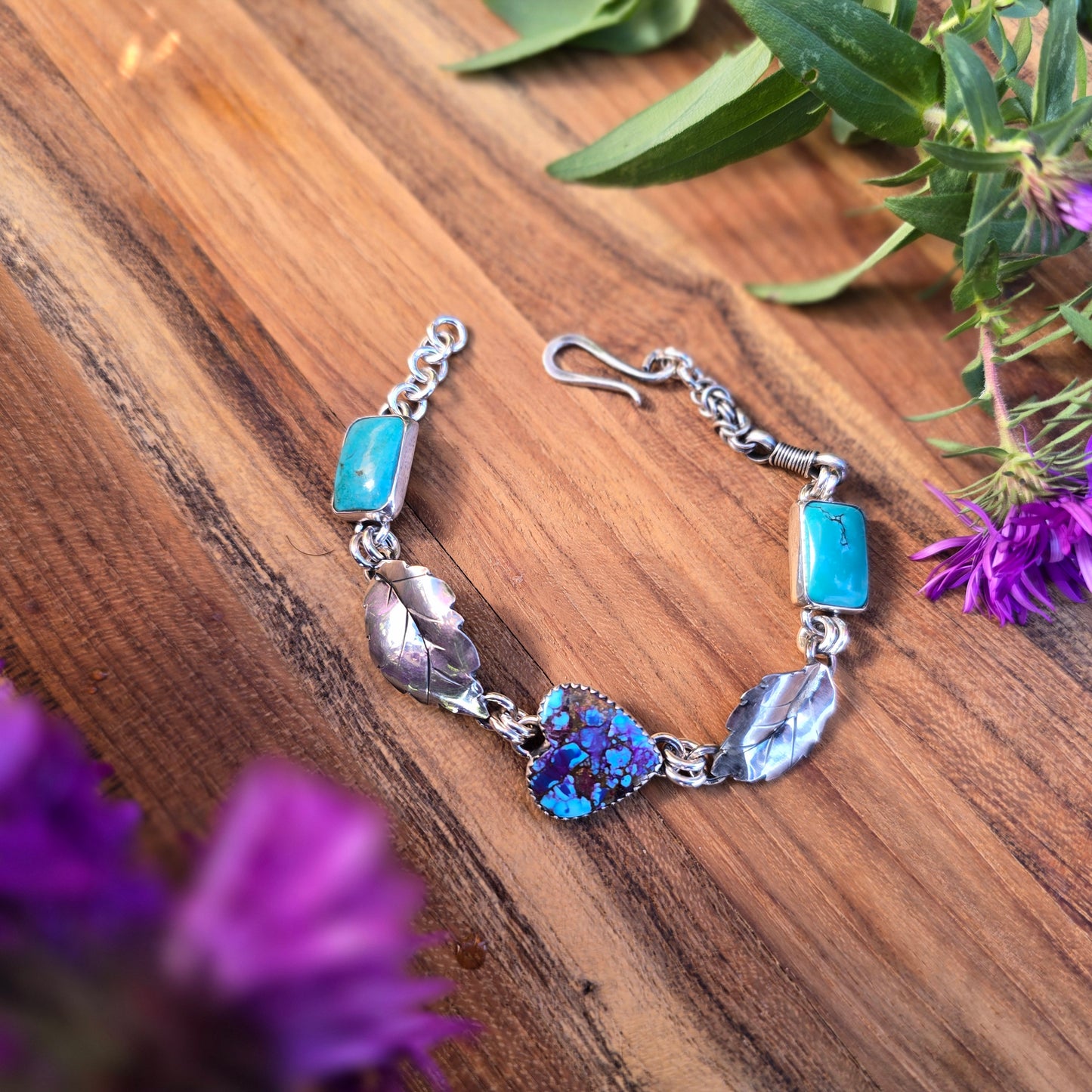 Artisan-crafted sterling silver and turquoise jewelry, hand-built by Adirondack silversmith Emily Dicob of Sterling Roots.
