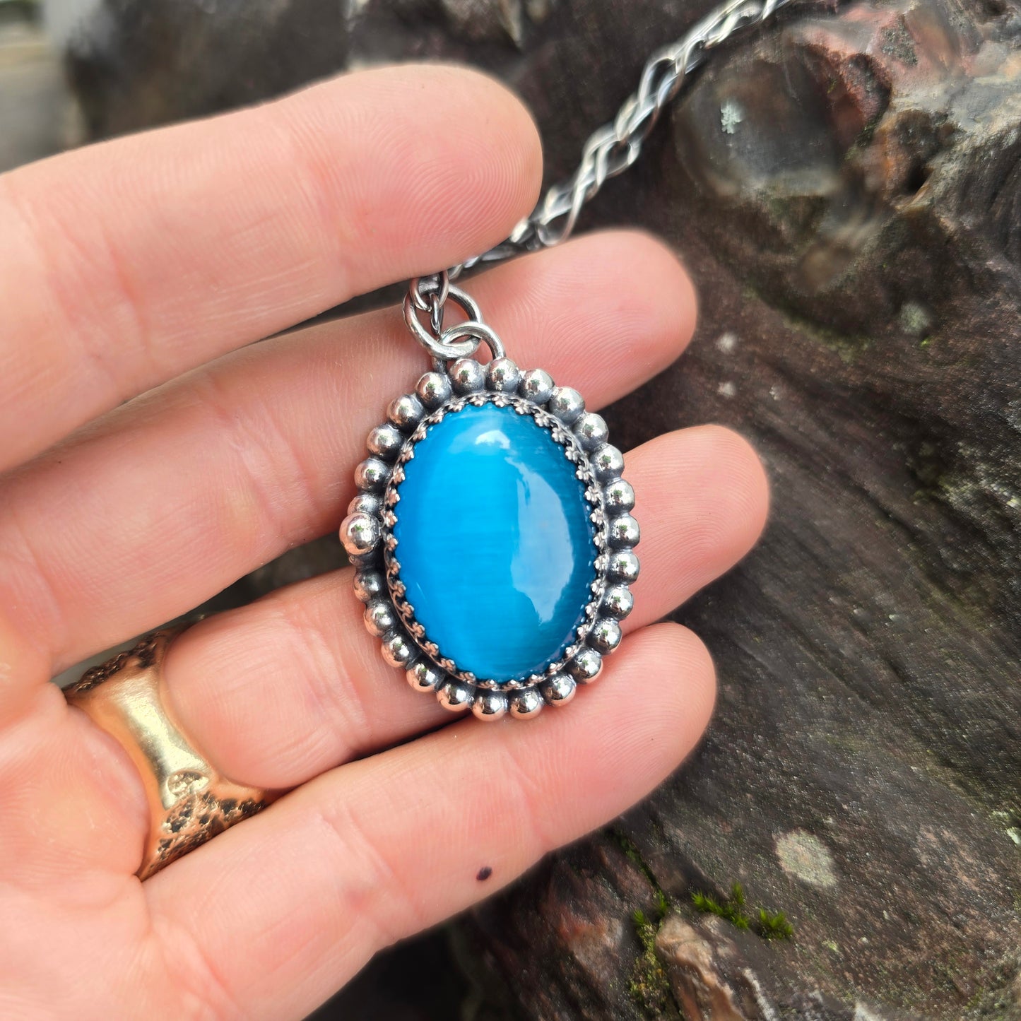 Blue Cat’s Eye Beaded Hand-Forged Sterling Silver Pendant