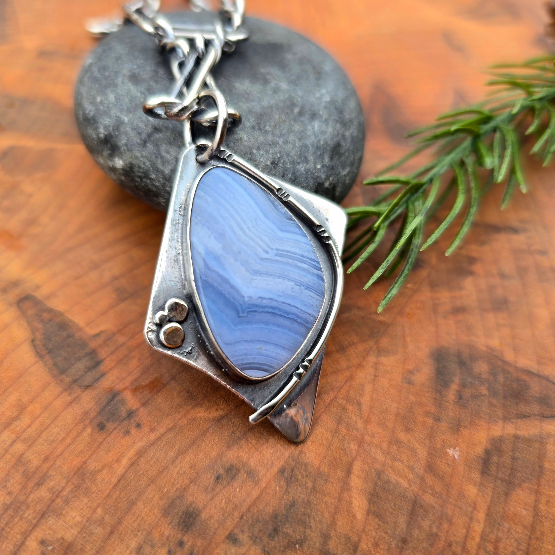 Geometric crazy lace agate pendant in sterling silver