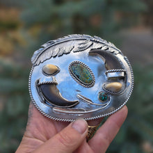 Load image into Gallery viewer, sterling silver belt buckle with turquoise centerpiece, elk ivory accents, and bear claw design

