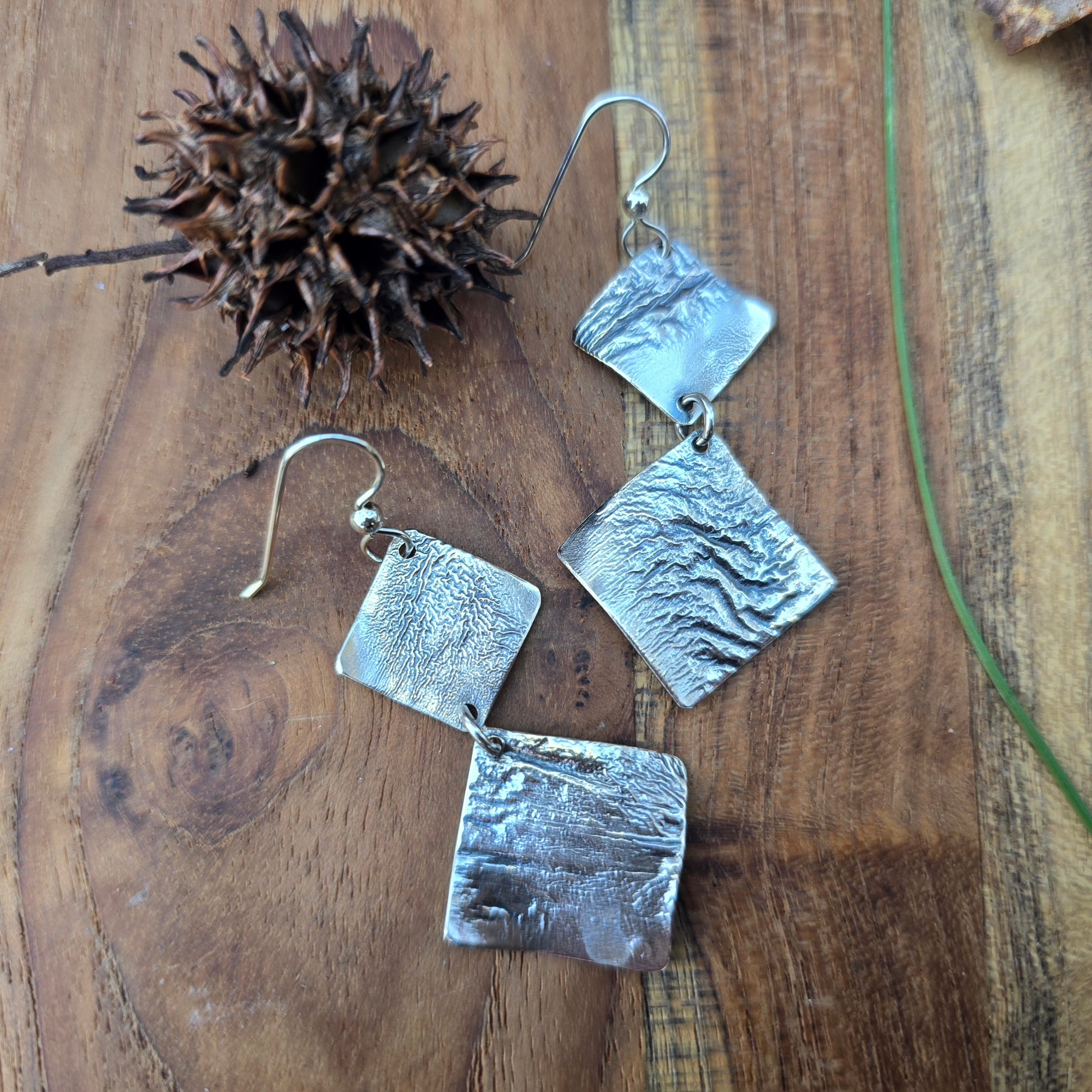 reticulated silver earrings top view
