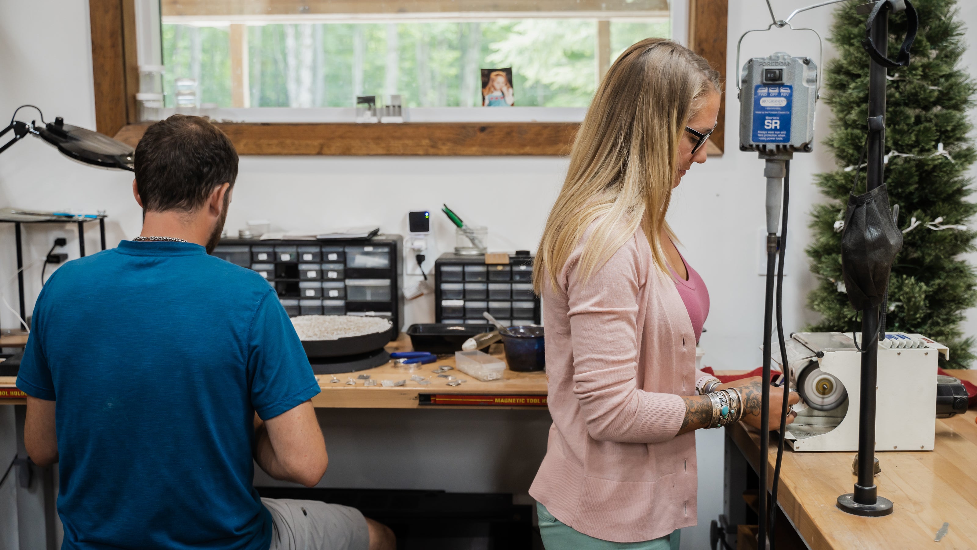 Emily and Shane Dicob working together at their silversmithing studio located in the Adirondack Foothills.