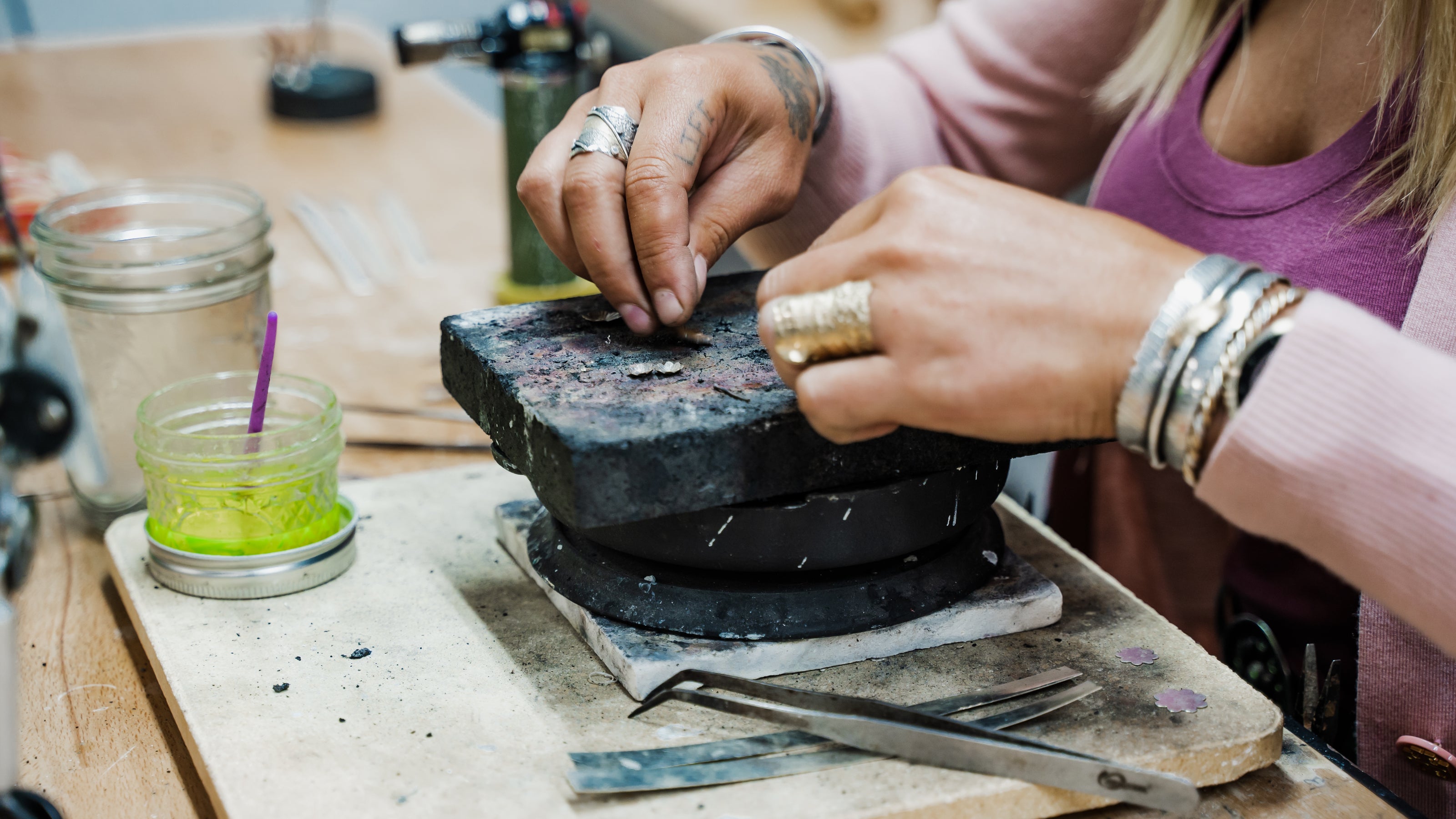 Emily Dicob of Sterling Roots hand-forging sterling silver jewelry at her Adirondack Foothills studio. 