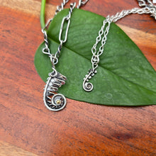 Load image into Gallery viewer, fern frond pendant with gold accent and dainty fern frond pendant displayed together on handmade chains
