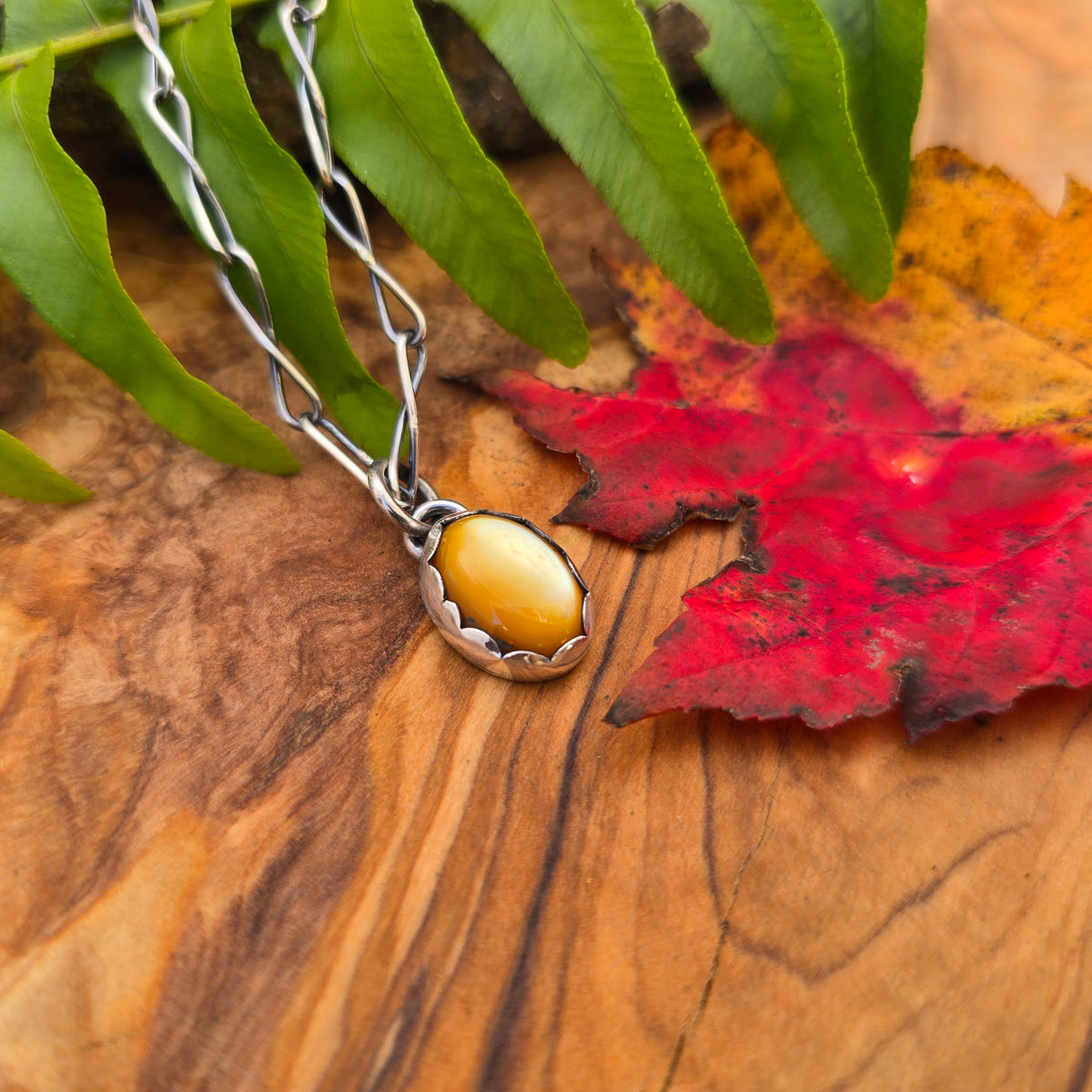 Golden Cat’s-Eye Minimalist Sterling Silver Pendant