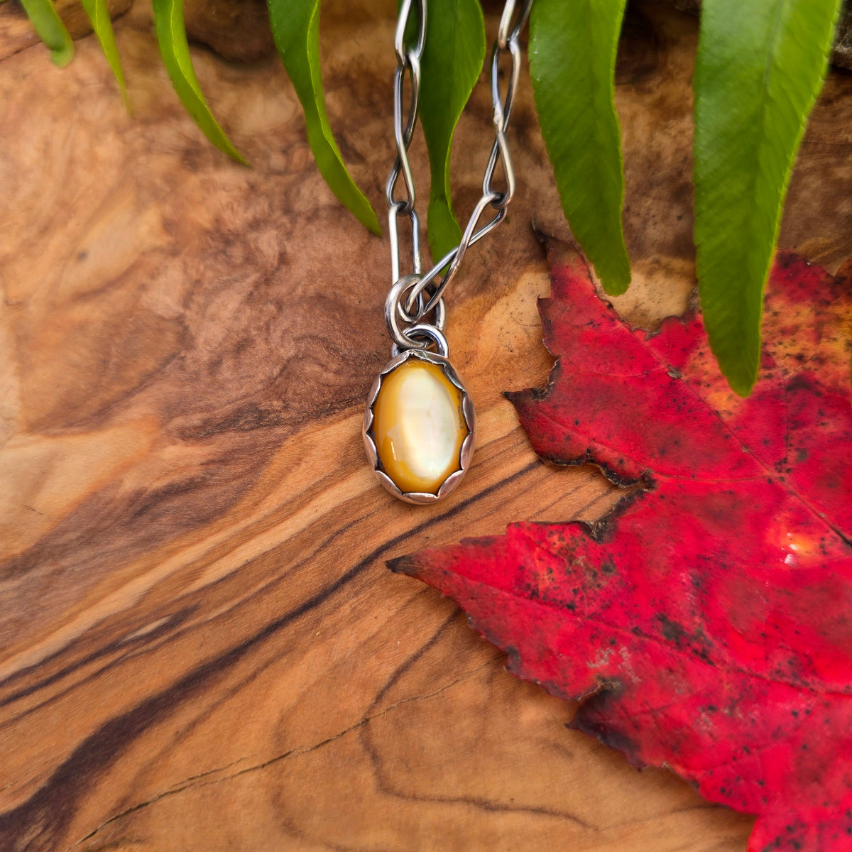 Golden Cat’s-Eye Minimalist Sterling Silver Pendant