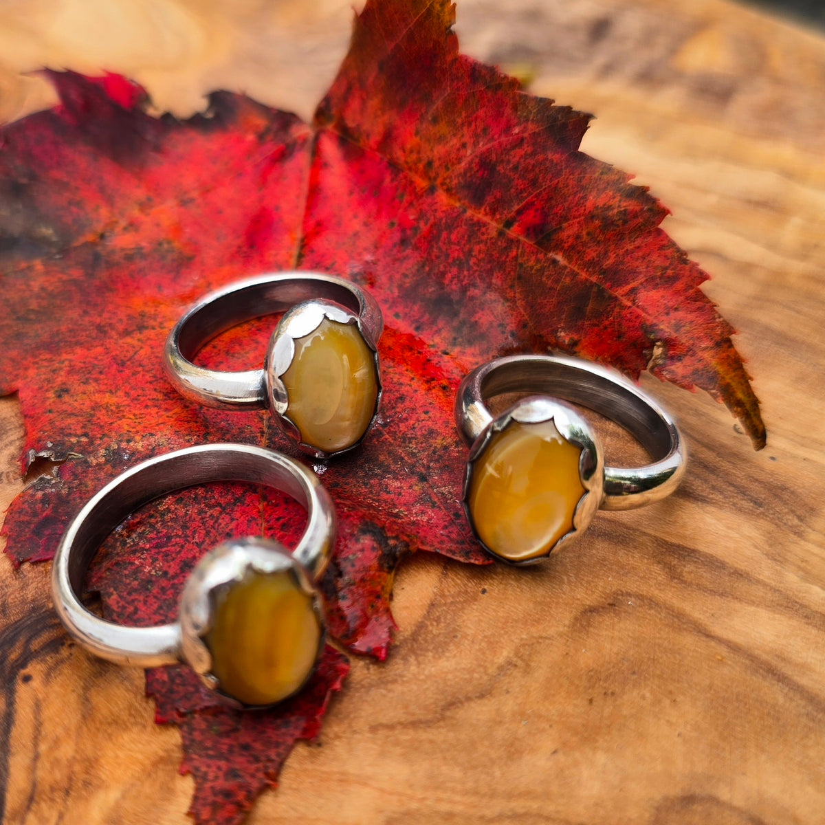 Golden Mother-of-Pearl Oval Sterling Silver Rings