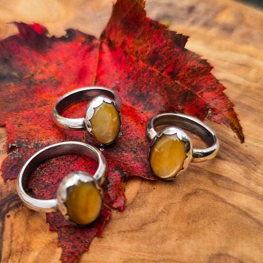 Golden Mother-of-Pearl Oval Sterling Silver Rings