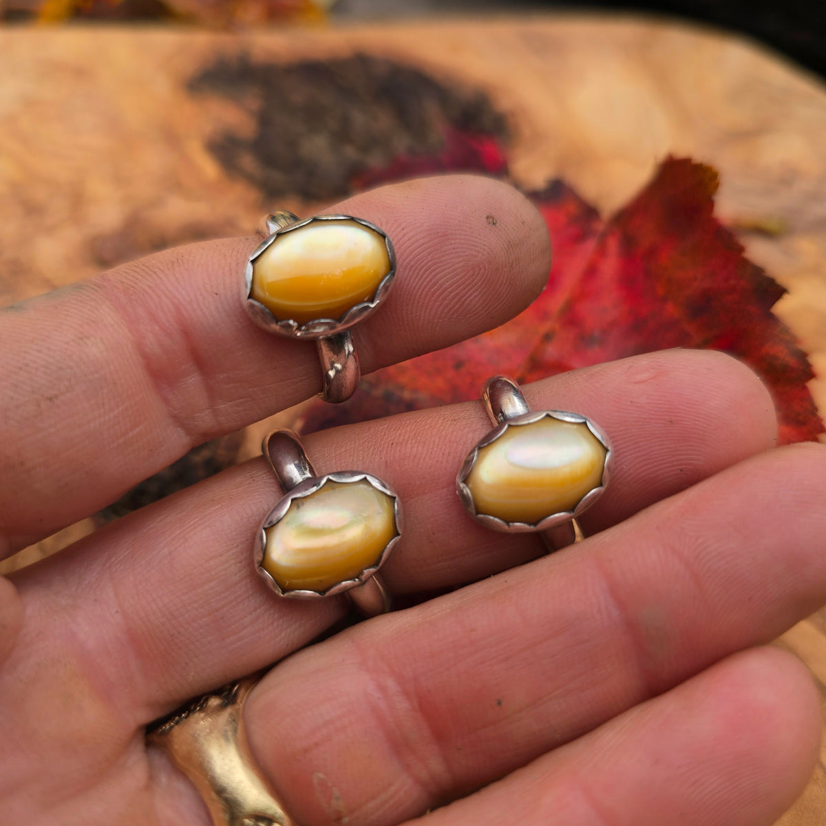 Golden Mother-of-Pearl Oval Sterling Silver Rings
