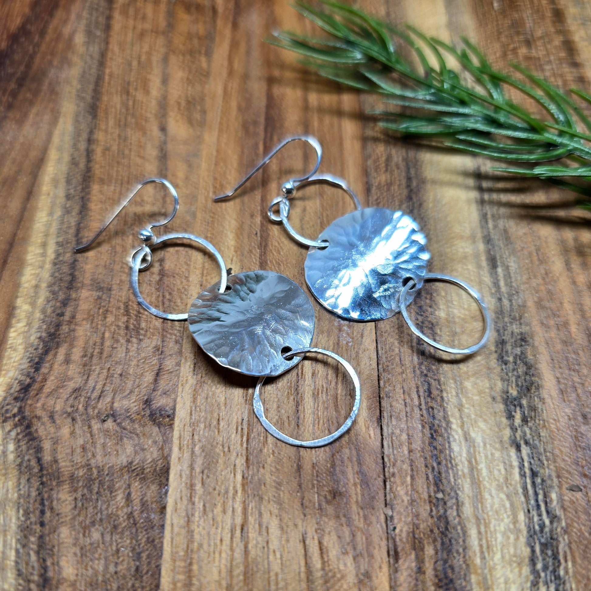Hand-forged sterling silver hoop and hammered disc earrings