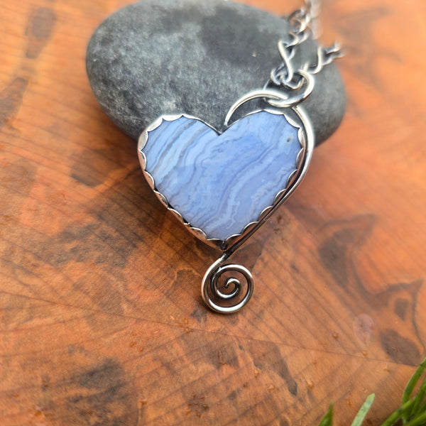 Nature-inspired crazy lace agate heart pendant