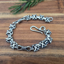Load image into Gallery viewer, Heavy oxidized sterling silver X O and bowtie bracelet
