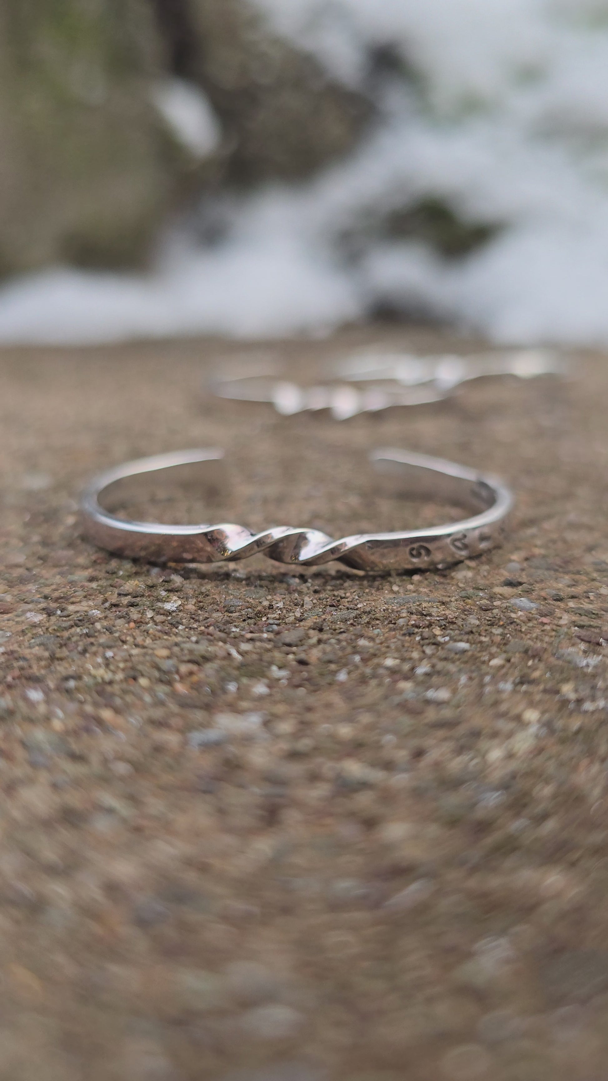 Handmade sterling silver baby cuff bracelet with custom stamping, crafted by Sterling Roots.