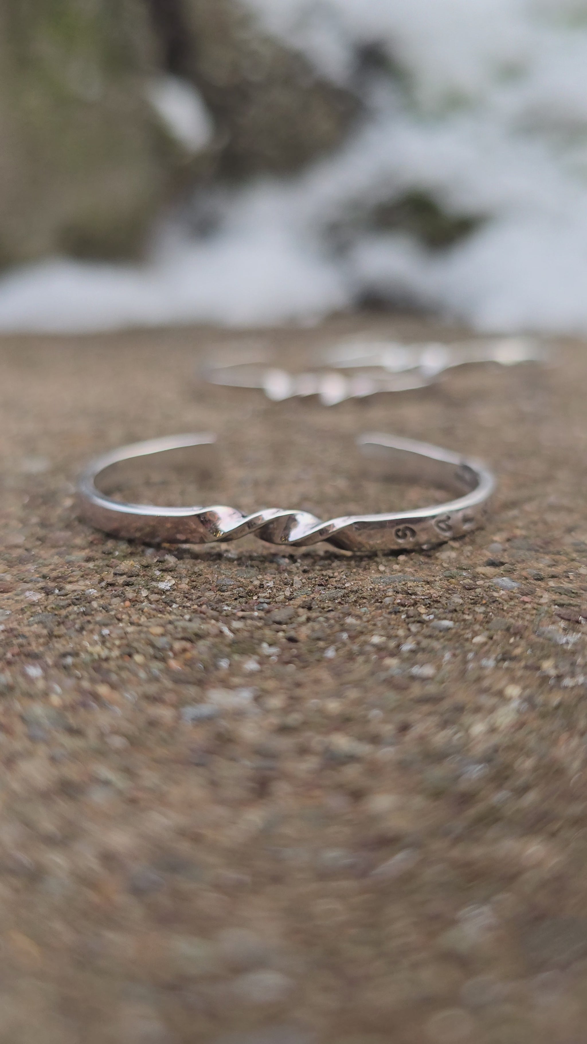 Handmade sterling silver baby cuff bracelet with custom stamping, crafted by Sterling Roots.