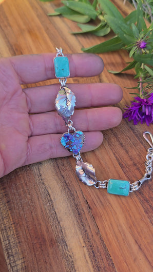 Hand-forged sterling silver journey bracelet with turquoise and hearts, created by Adirondack silversmith Emily Dicob in Northern New York.