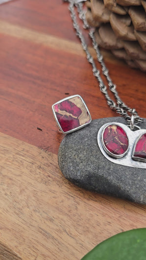 red dahlia mohave rings, two-stone pendant, and oxidized twisted link chain displayed together