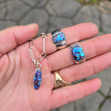 Load image into Gallery viewer, purple mohave turquoise wide band rings and dainty pendant displayed together
