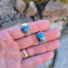 Load image into Gallery viewer, purple Mohave turquoise wide band rings with textured bands worn on hand
