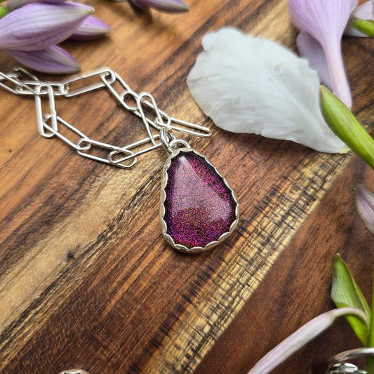 Sterling silver and simple red dichroic glass pendant